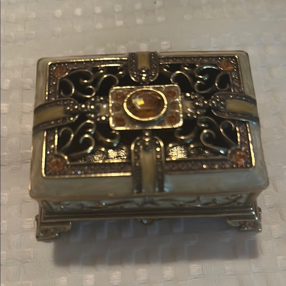 Elegant Gold and Black Jewelry Box
